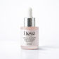 Élevé PDRN Pink Peptide Serum in a frosted glass dropper bottle with a soft pink tint, silver cap, and white label, placed on a minimal light grey background