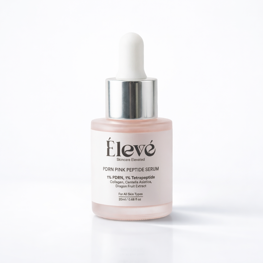Élevé PDRN Pink Peptide Serum in a frosted glass dropper bottle with a soft pink tint, silver cap, and white label, placed on a minimal light grey background